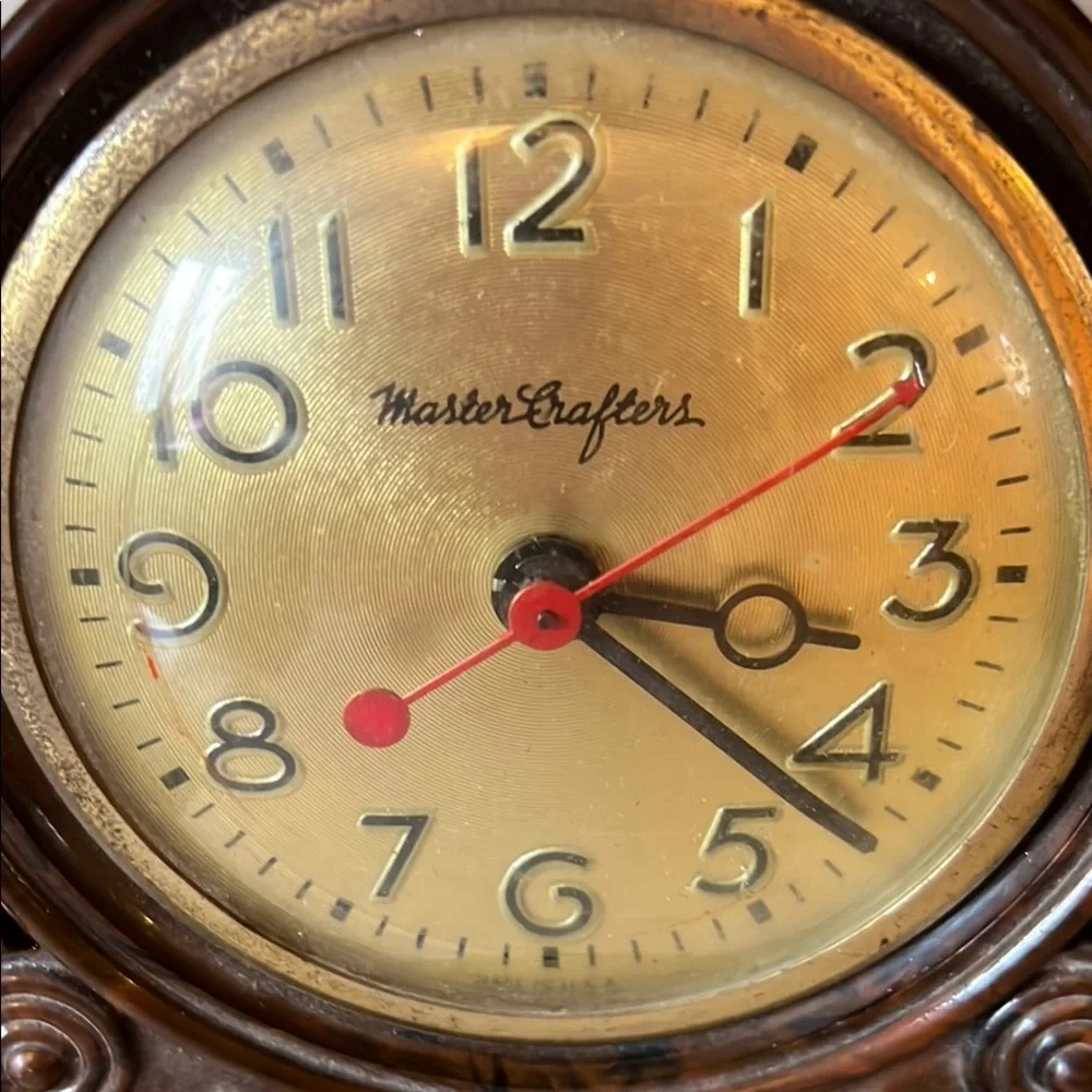 Brown Mantel Clock with Fireplace Design